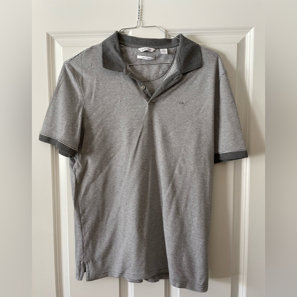 Men’s Calvin Klein polo gray, and white striped.
